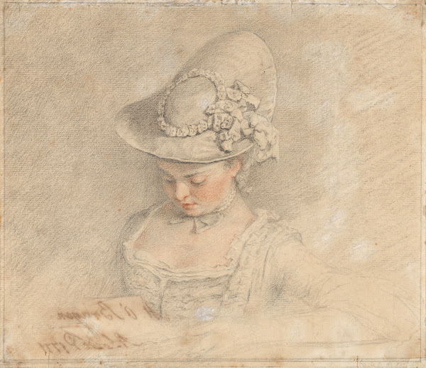 A young girl wearing a bonnet