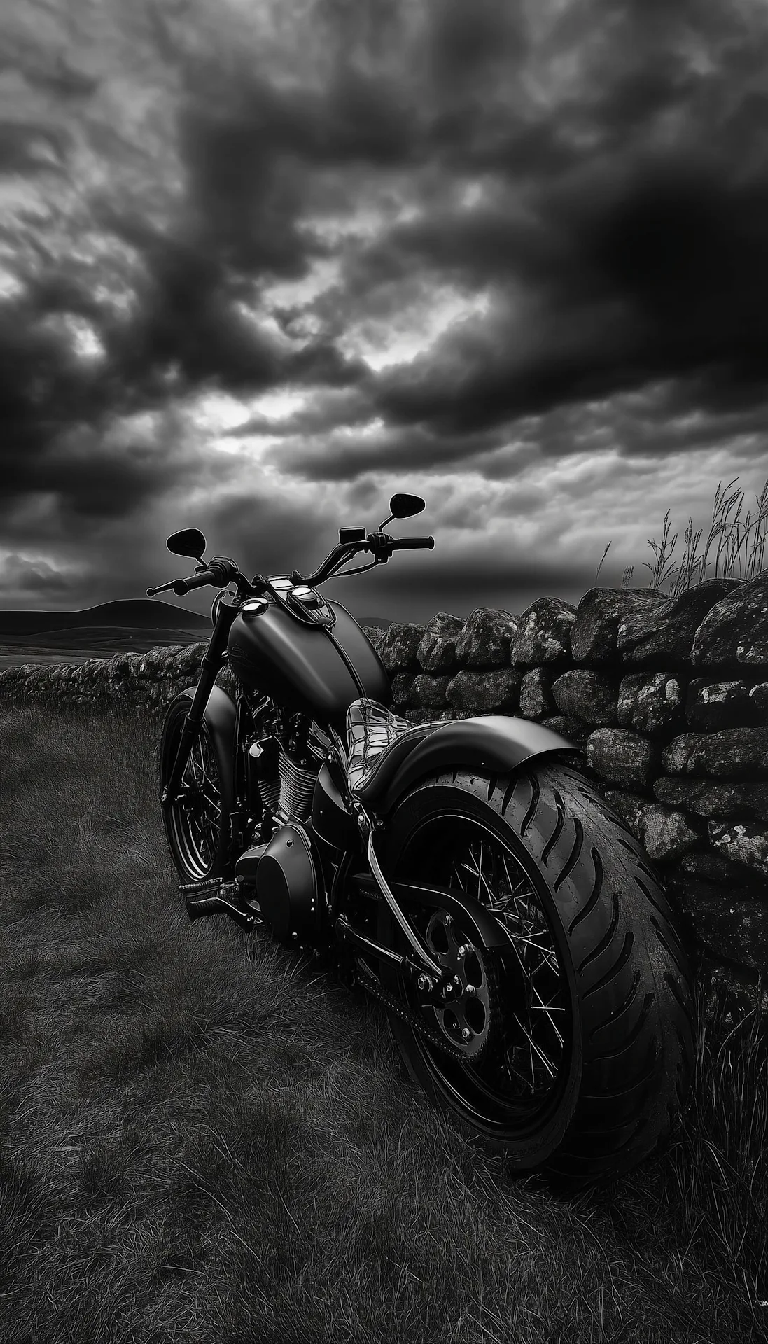 Monochrome Chopper Motorcycle Against Stormy Rural Sky - Free 4K mobile Wallpaper