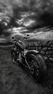 Monochrome Chopper Motorcycle Against Stormy Rural Sky