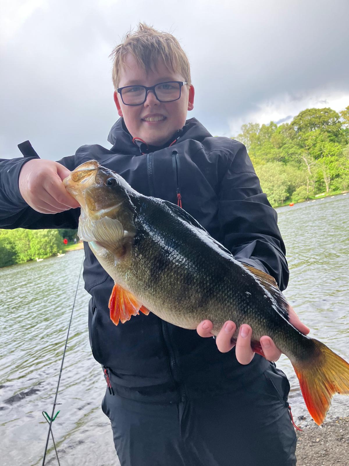 Harry Griffen with a Perch caught ledgered worm fishing at a local loch