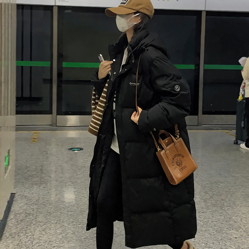Long padded women's winter coat, loosely cut