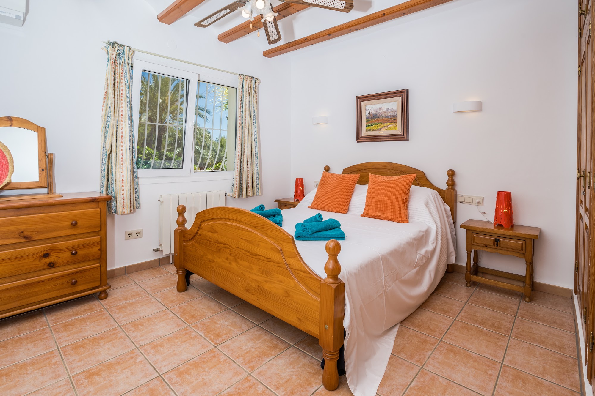 Double bedroom with wooden bed frame
