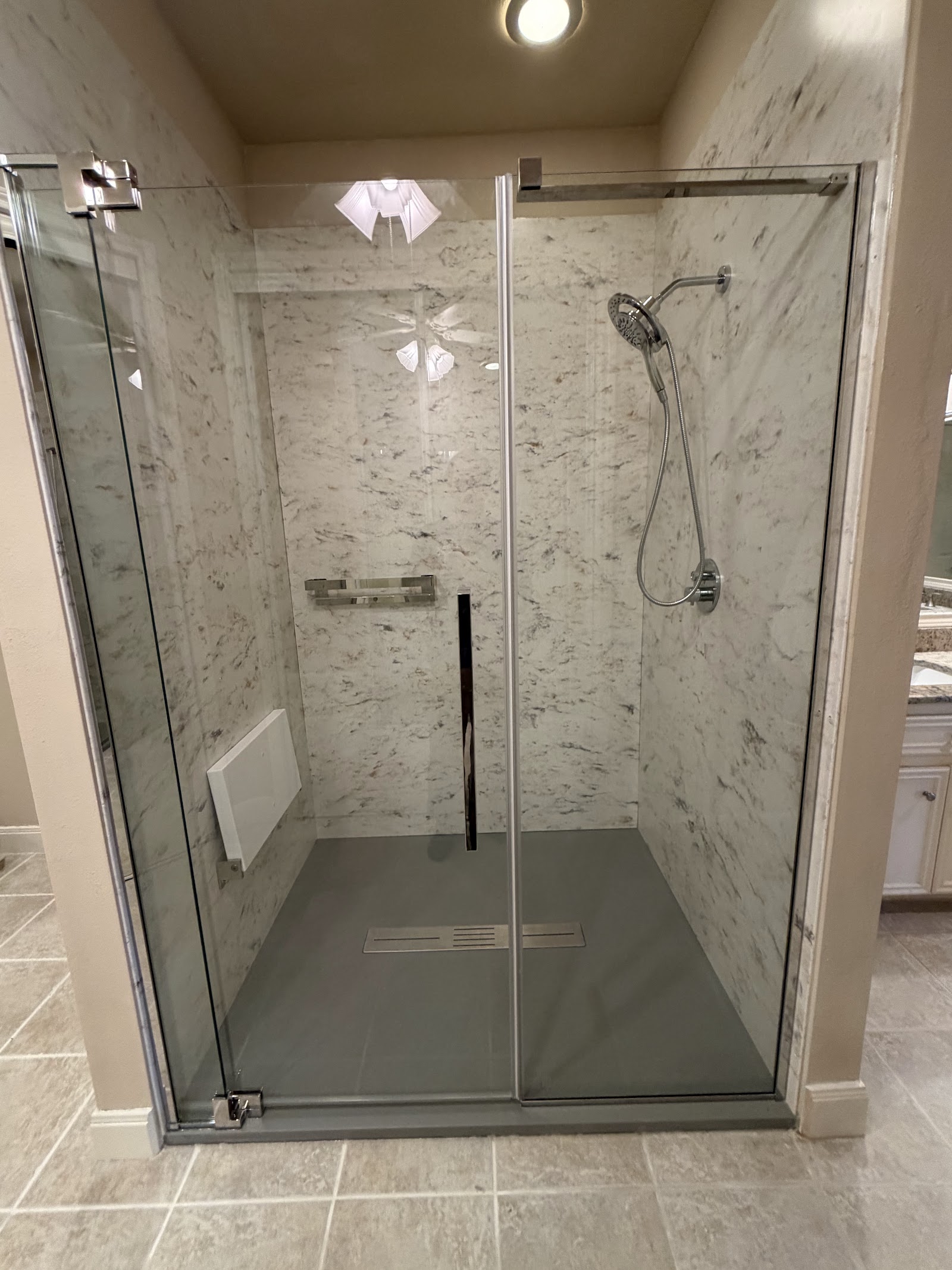 After shower installation — new walk-in shower with frameless glass by Cascade Showerworks