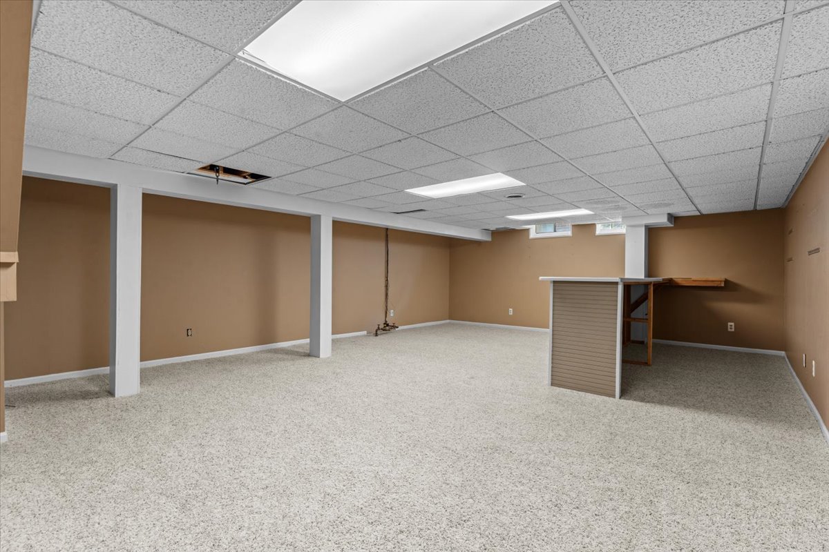 Finished basement with large storage room at 13656 Heatherwood Drive, Sterling Heights, MI