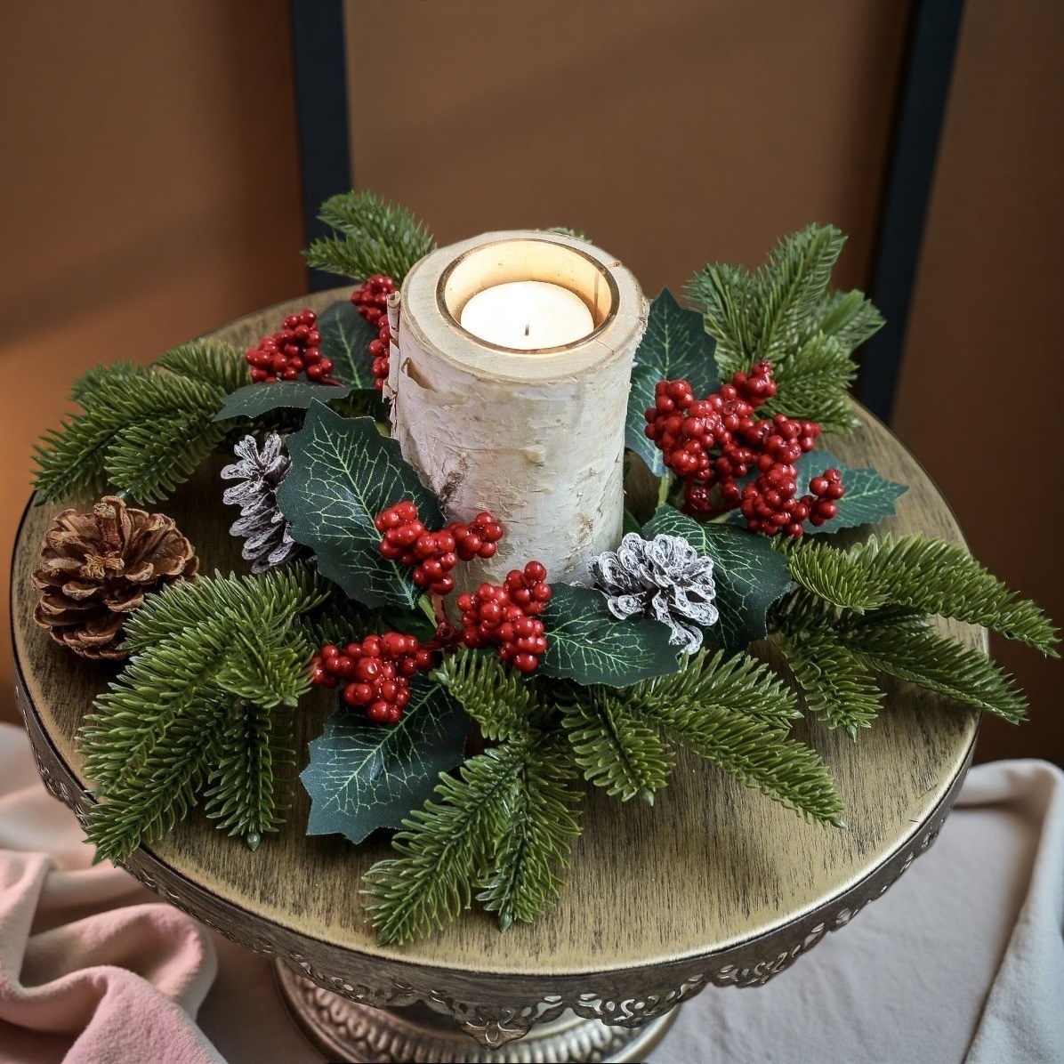 Christmas table wreath with pine cones and berries