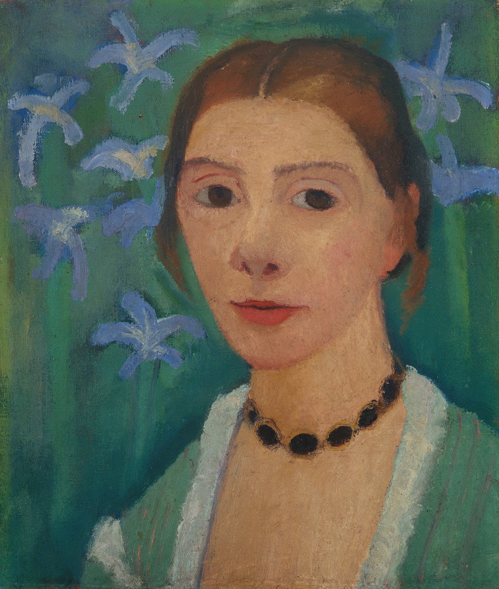 Self portrait in front of a green background with a blue iris between 1900 and 1