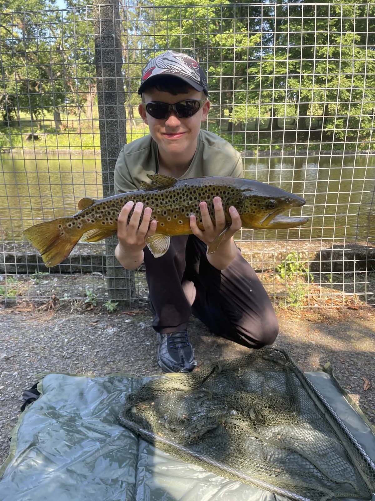 Arran Wards with a Brown Trout caught on bread under a float at Dalmuir Park Ponds
