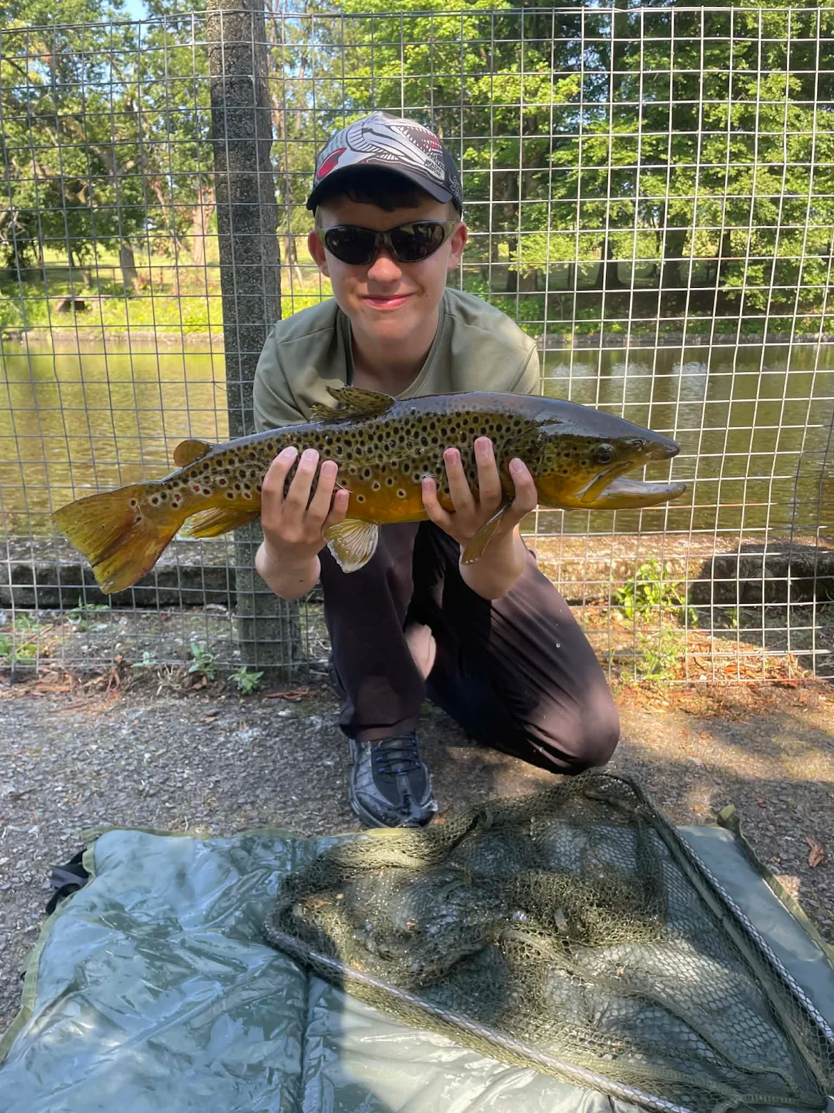 Arran Wards with a Brown Trout caught on bread under a float at Dalmuir Park Ponds