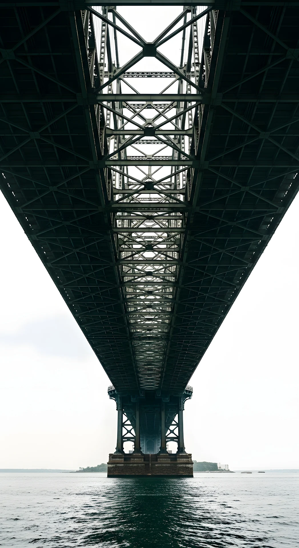 Dramatic Low Angle View Upwards Under Massive Steel Bridge Structure and Supports - Free 4K mobile Wallpaper