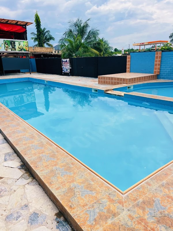 Point 3 Hotel swimming pool at sunset, Adeiso, Ghana