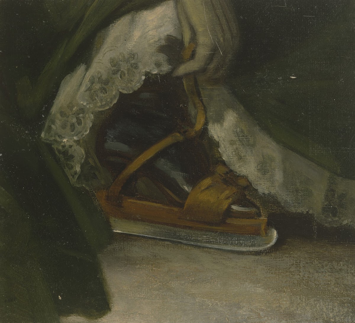 Fuß einer Dame mit Schlittschuh
