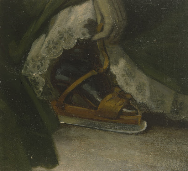 Fuß einer Dame mit Schlittschuh