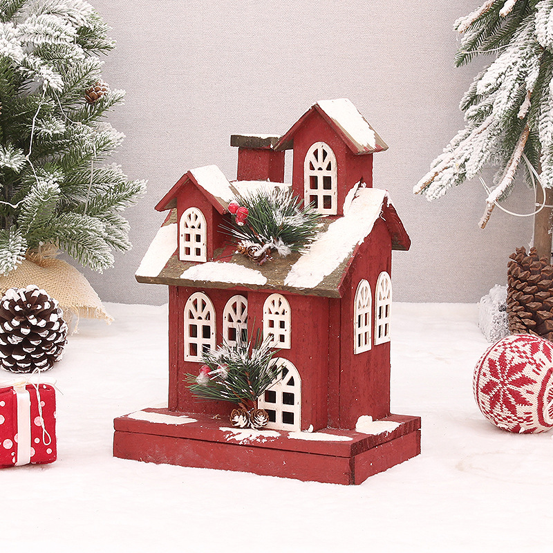 Beleuchtetes rotes Holzhaus, Weihnachtsdekoration