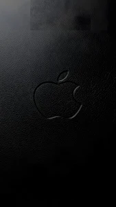 Embossed Apple Logo on Black Leather Texture