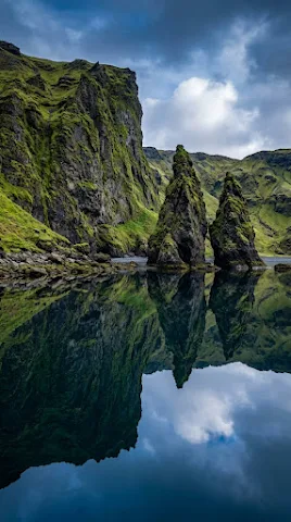 Dramatic Icelandic Cliff Reflection