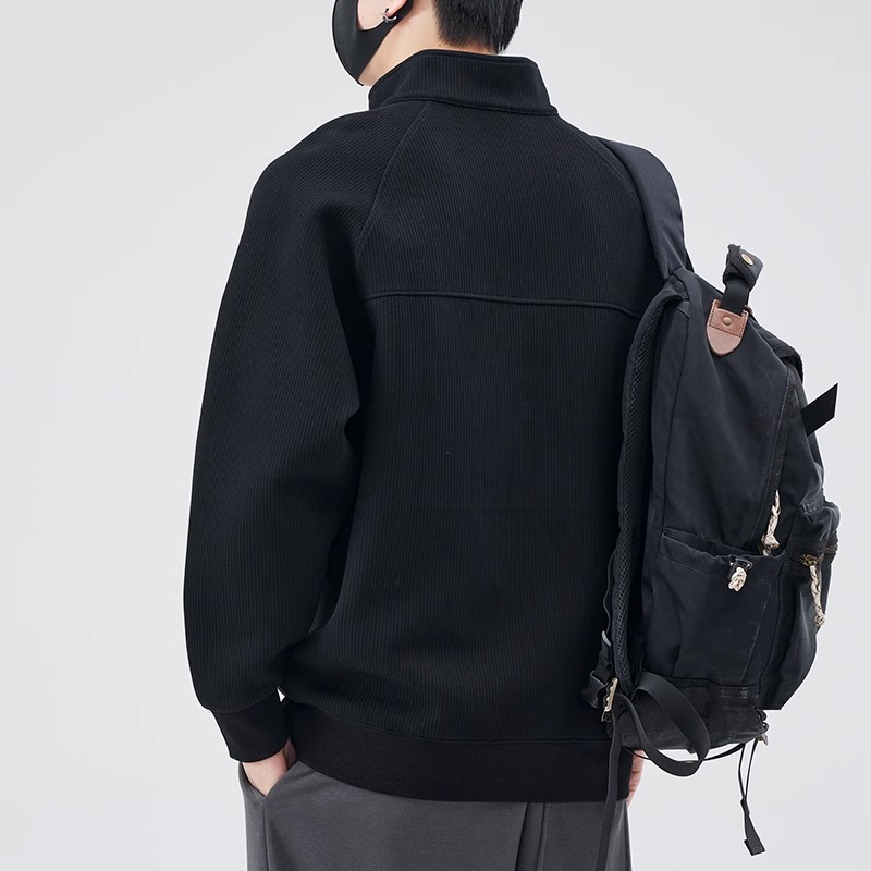 Loose sweater with stand-up collar and zipper