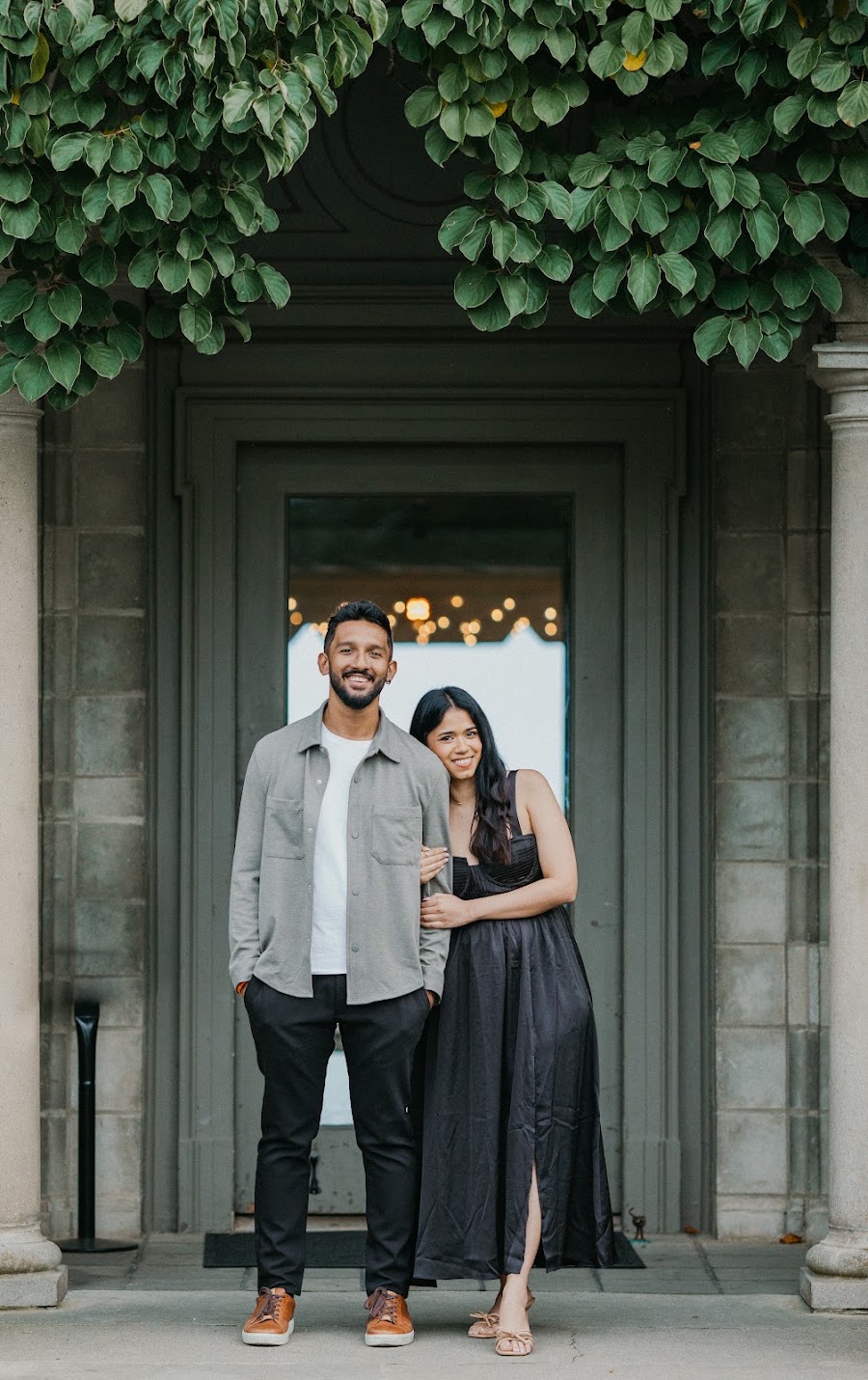 Couple holding hands during engagement session