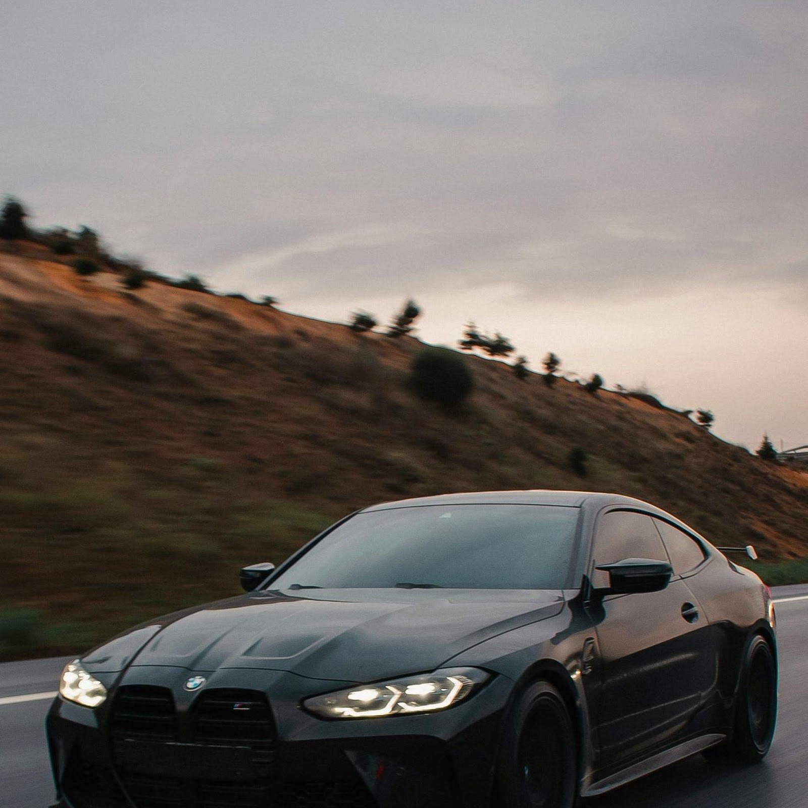 Download Black BMW M4 Driving Fast 2K iPhone