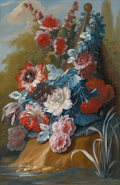 Bouquets of flowers on a ledge above water