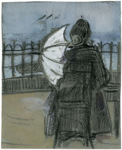 Dame met parasol zit op de pier in Scheveningen