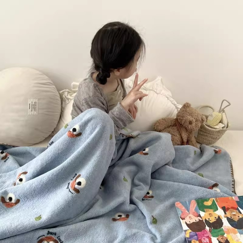 Cozy children's living blanket with cartoon motif, various sizes