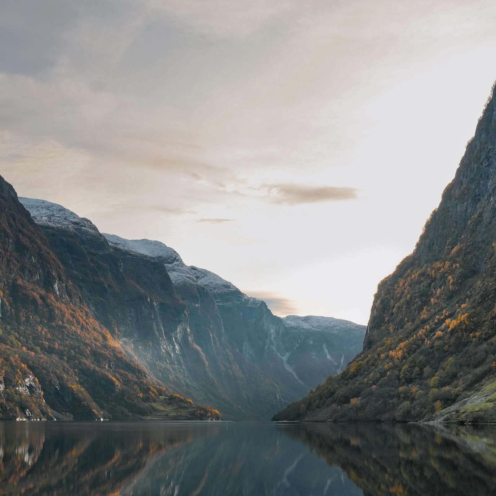 Download Mountain Reflection In Calm Fjord 4K iPhone