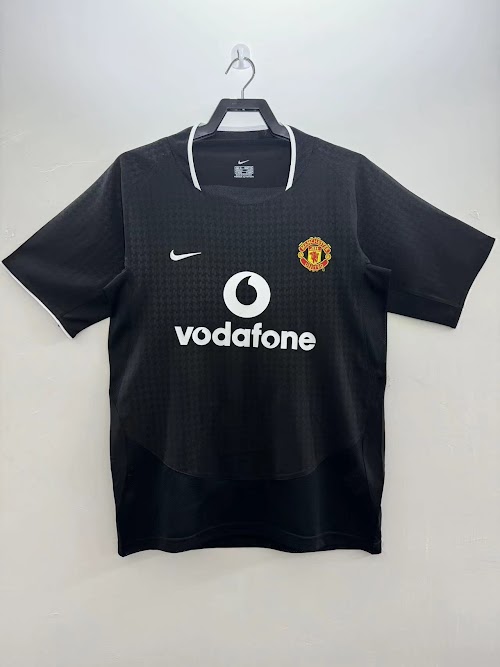 Equipación visitante del Manchester United 2003-04.jpg