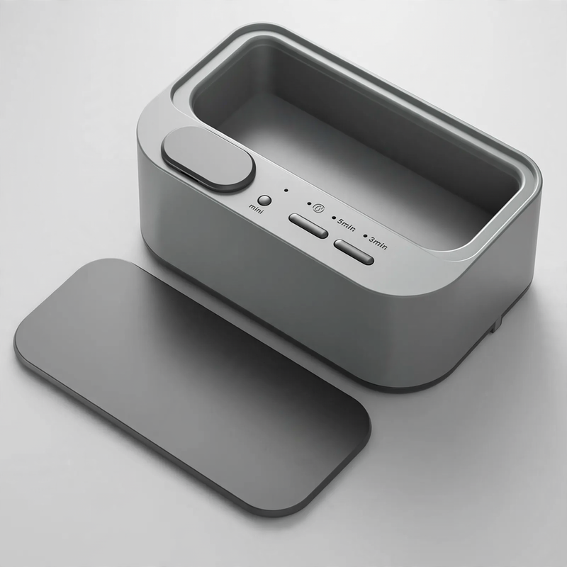 Ultrasonic cleaning device, portable, dual chamber