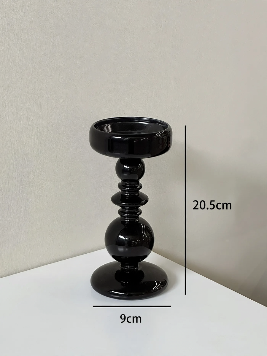 Decorative candle holder made of glass and wood