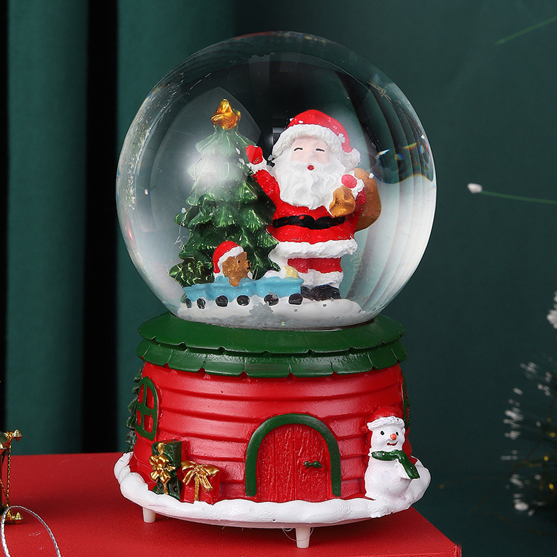 Weihnachtliche Schneekugel mit Musik und Licht