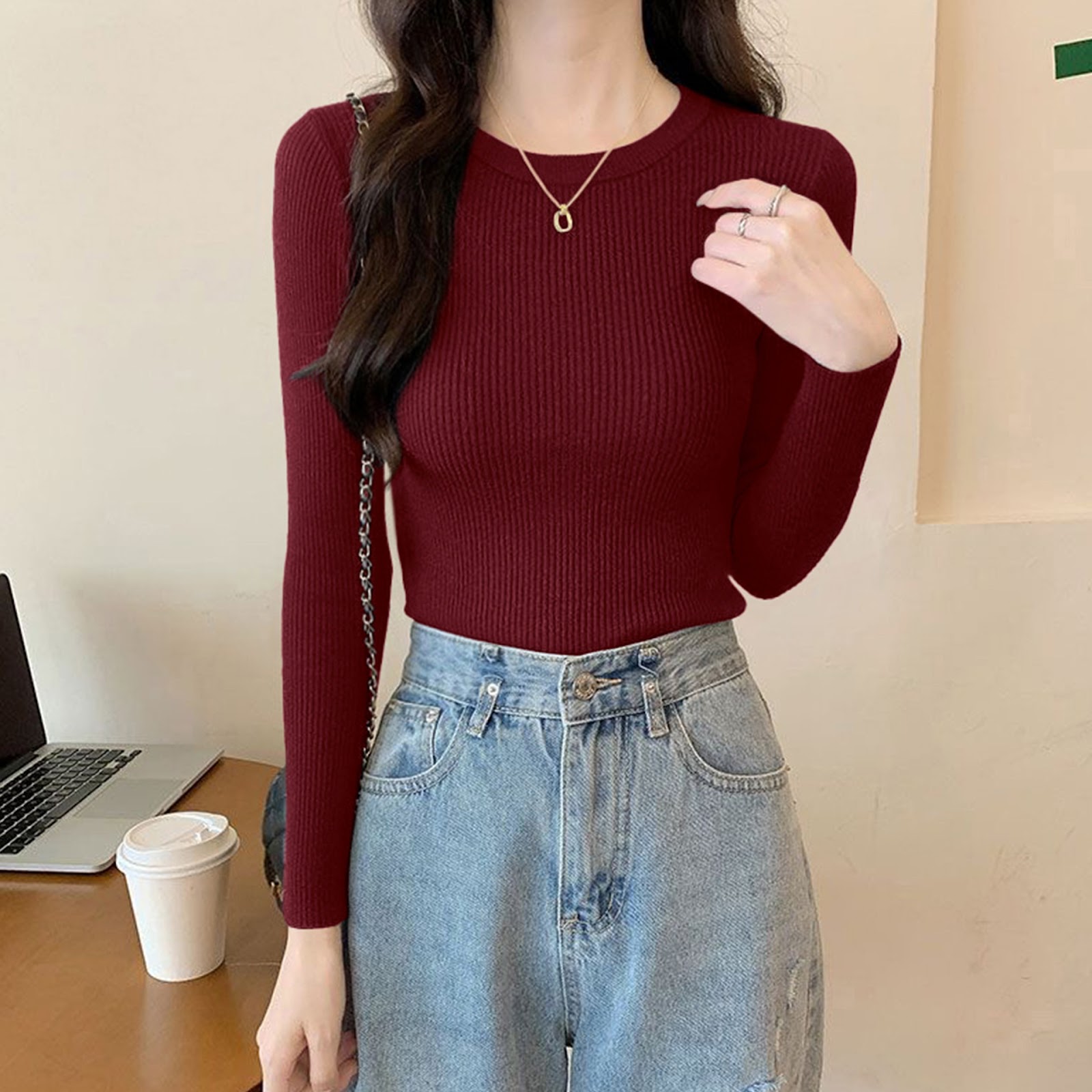 Women's knitted sweater with round neckline