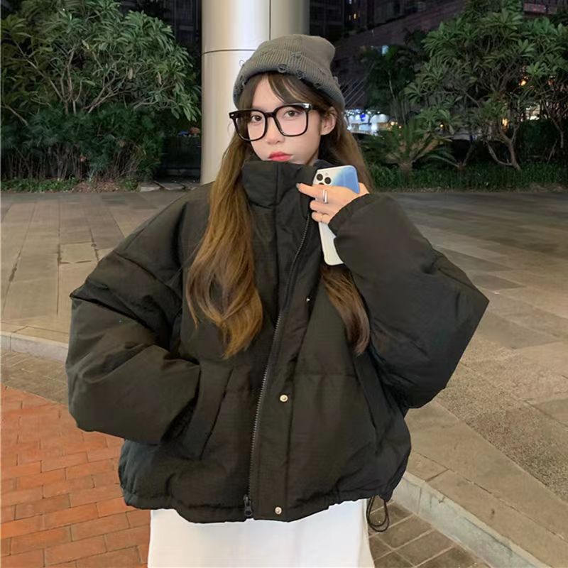 Short, padded women's jacket, loose fit