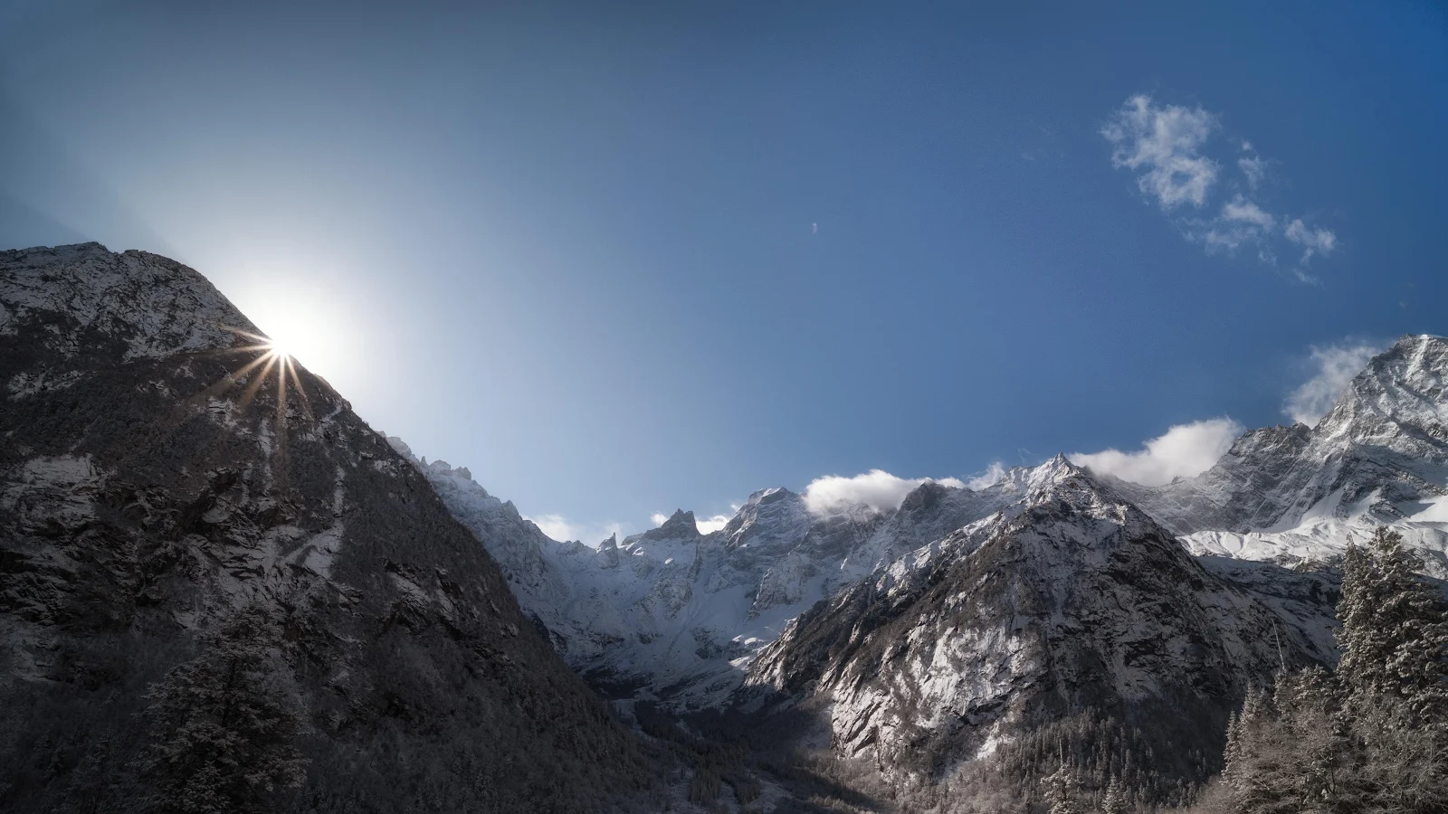 Sunburst Over Snowy Mountain Peaks - Landscape Photography 4K Wallpaper (4263x2398)