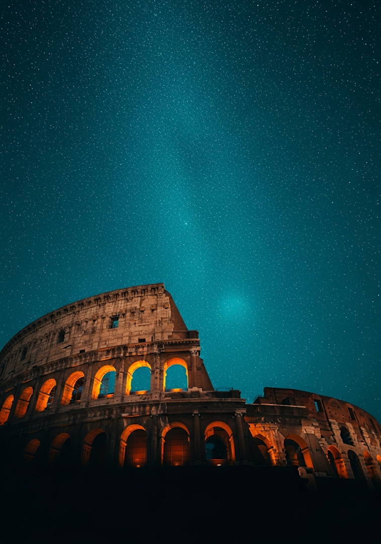 Colosseum Under Teal Starry Sky