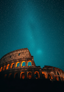 Colosseum Under Teal Starry Sky