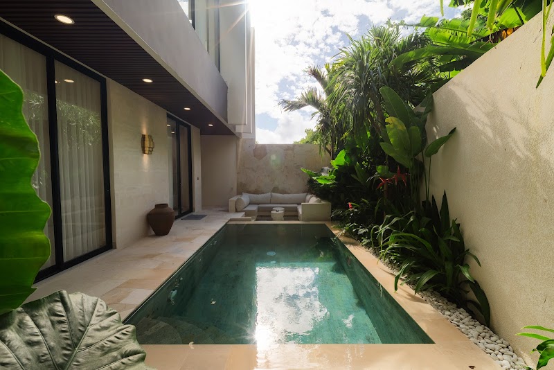 Private pool and timber deck lounge at La Calma villa Uluwatu