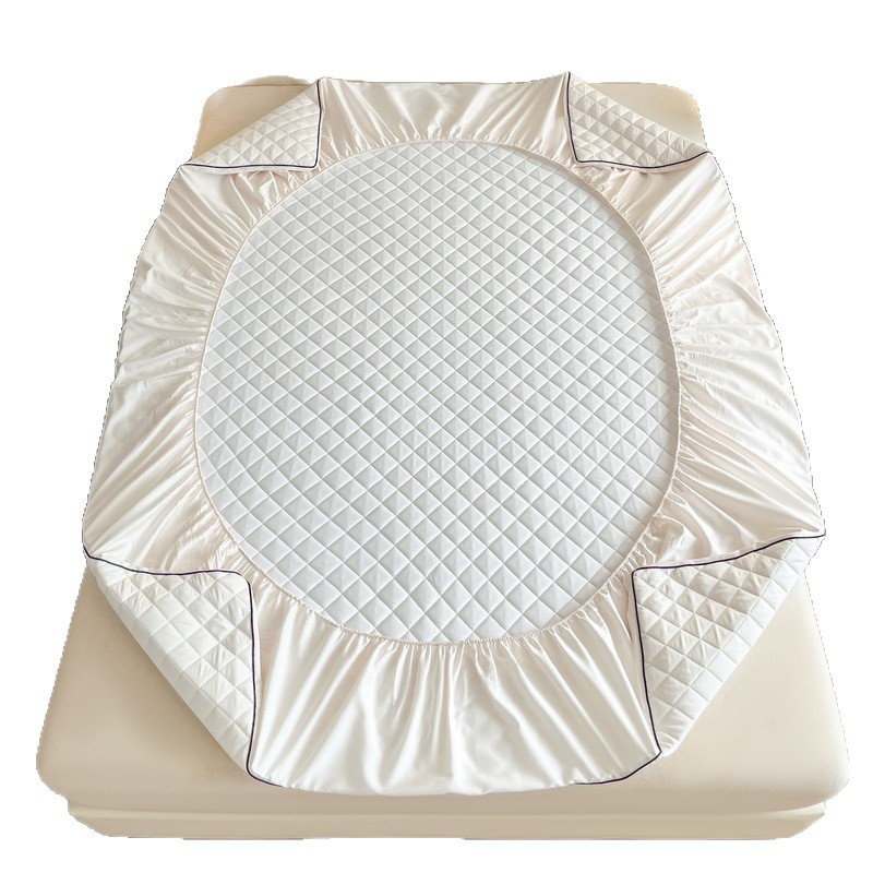 Quilted fitted cover with slip protection