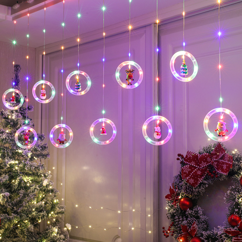 LED-Lichtervorhang mit weihnachtlichen Motiven