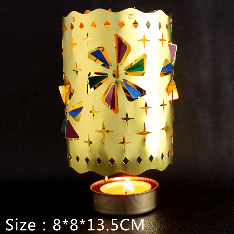 Rotating brass tea light holder, classic design