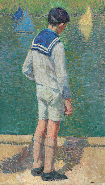 Petit garçon au bord du bassin du Jardin du Luxembourg à Paris