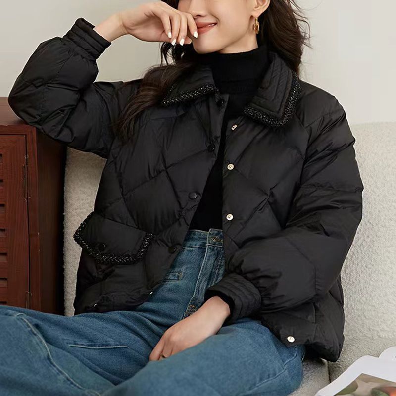 Short women's quilted jacket in a diamond design
