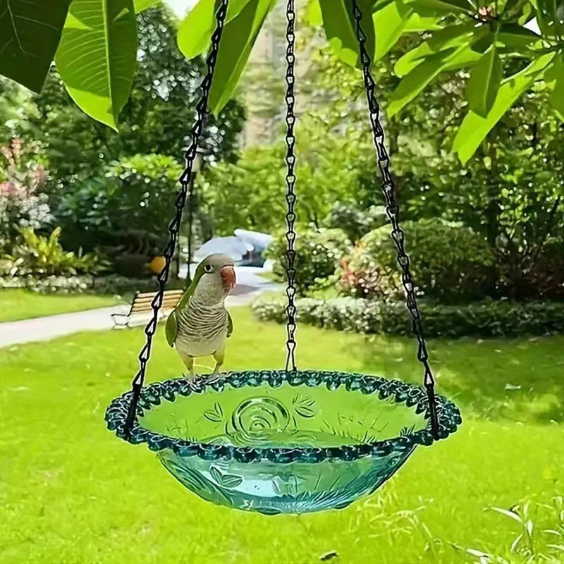 Hanging feeder and bird bath made of plastic