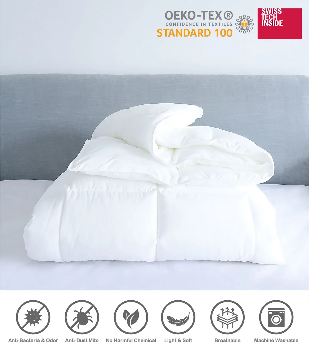 White anti-allergy duvet on a grey bed with Oeko-Tex Standard 100 and Swiss Tech Inside badges and feature icons