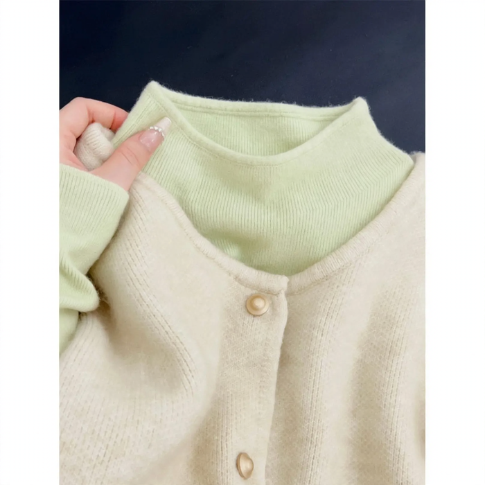 Women's knit pullover with stand-up collar, solid color