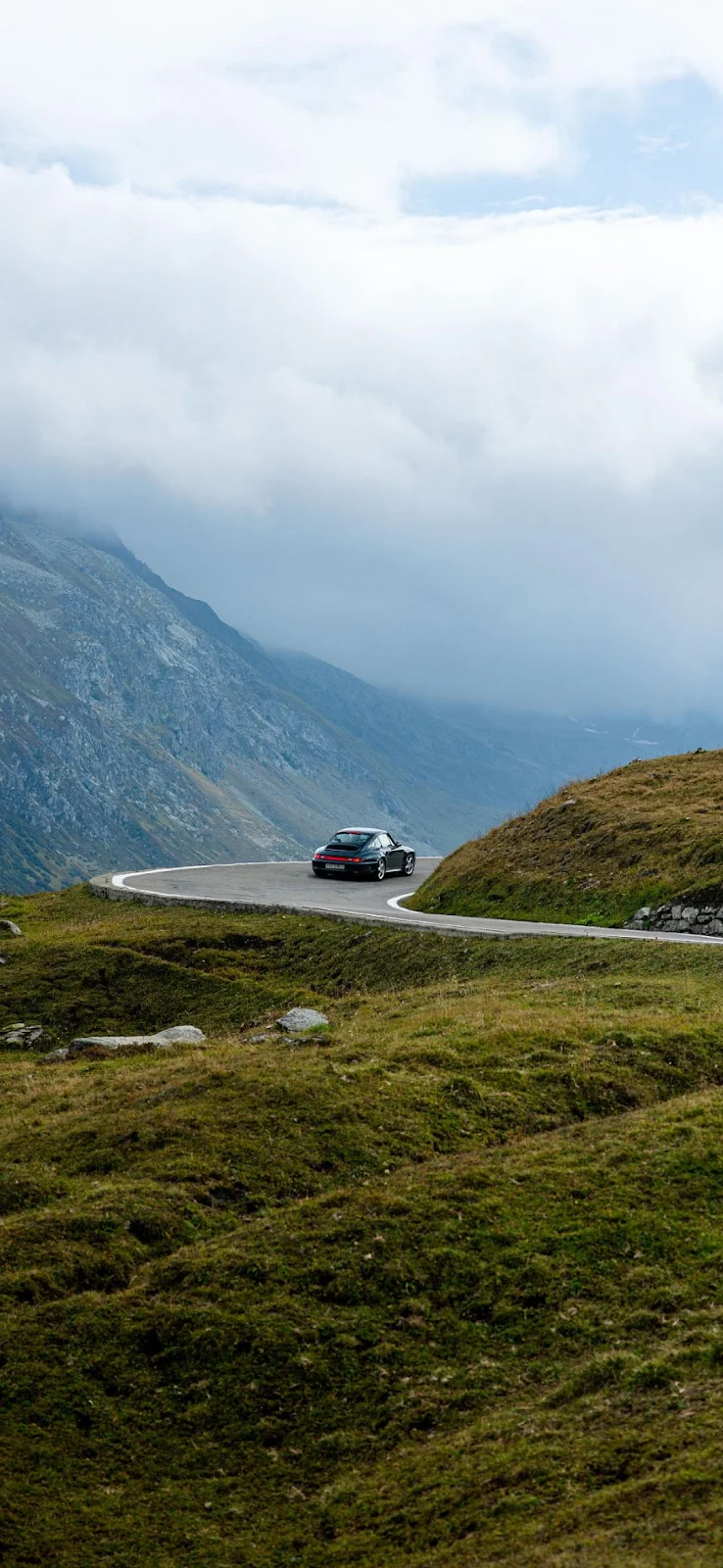 Classic Porsche Drives Mountain Road - Landscape Photography Full HD iPhone Wallpaper (1080x2340)