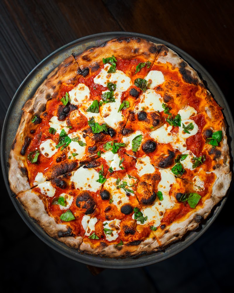 Wood-fired margherita pizza overhead — restaurant photography Hudson Valley