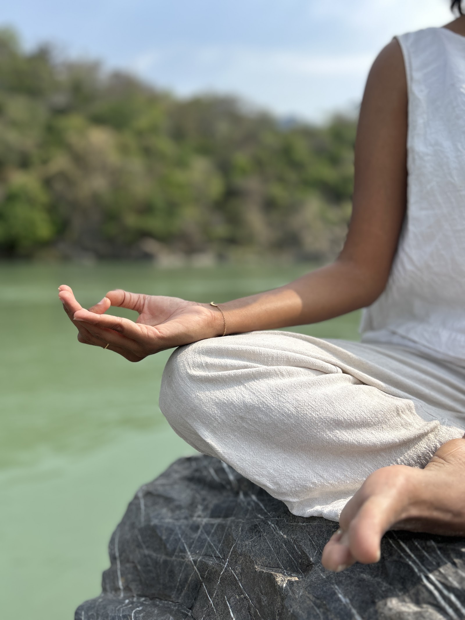 A long-held Yin Yoga posture in soft evening light