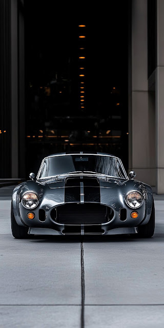 Classic Shelby Cobra Sports Car in Urban Garage Setting - Free mobile Wallpaper