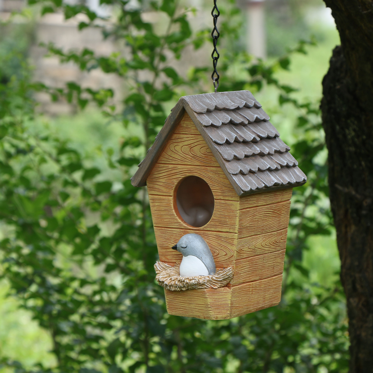 Decorative birdhouse made of resin, various designs