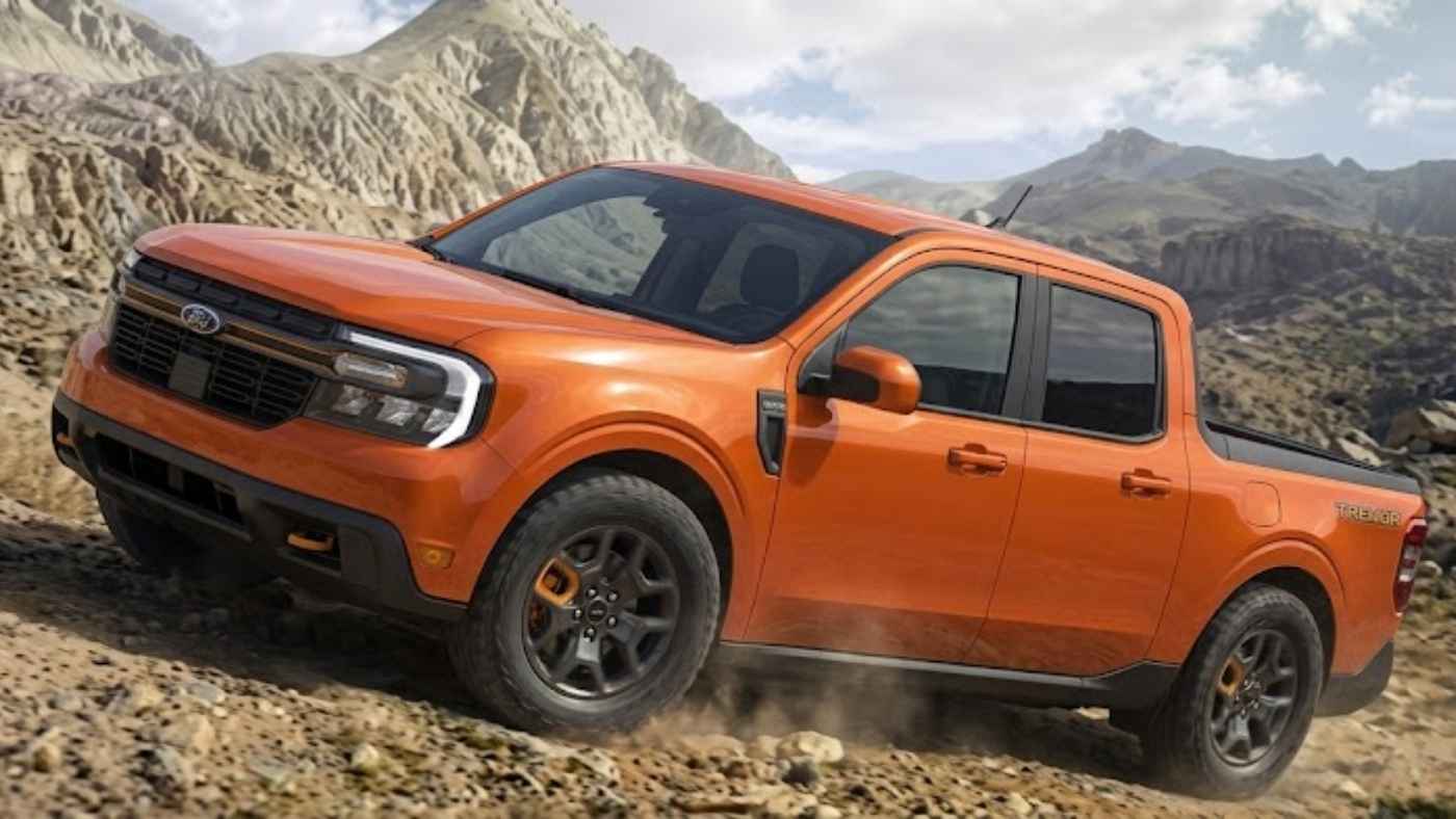 2026 Ford Maverick Lobo driving off-road, highlighting the new sport-focused trim with EcoBoost power and standard AWD.